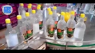 دستگاه پرکن دربند گلاب و عرقیات منوبلوک توان صنعت | 09152000050