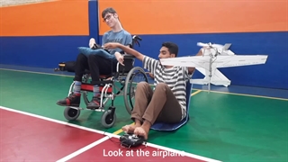 Ali Asgari Lemjiri with teenagers with Cerebral Palsy to prove their hidden intelligence & talent