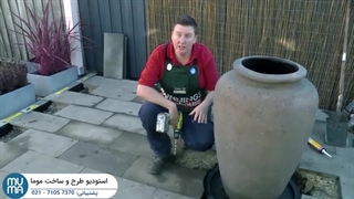 نحوه ساخت آبنمای دیواری با استفاده از سنگ‌های طبیعی و نورپردازی زیبا